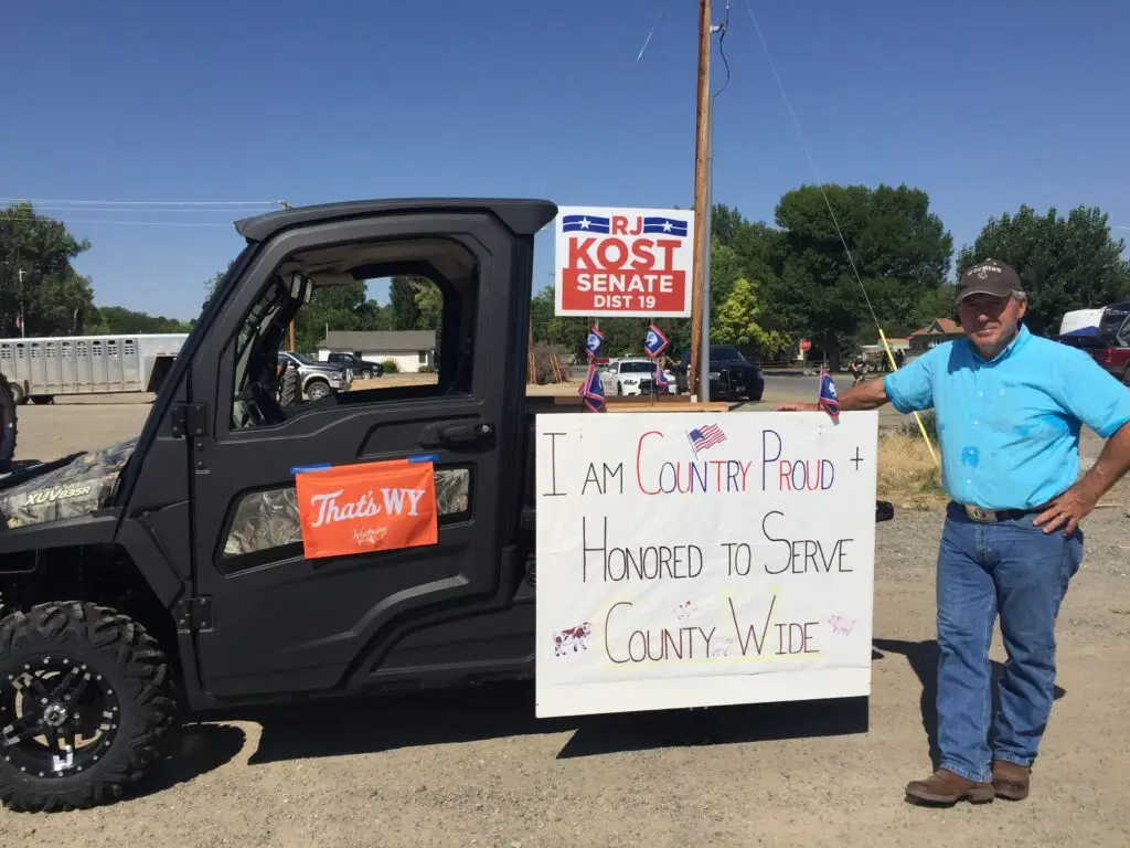RJ Kost at parade display highlighting service, pride, and commitment to county residents